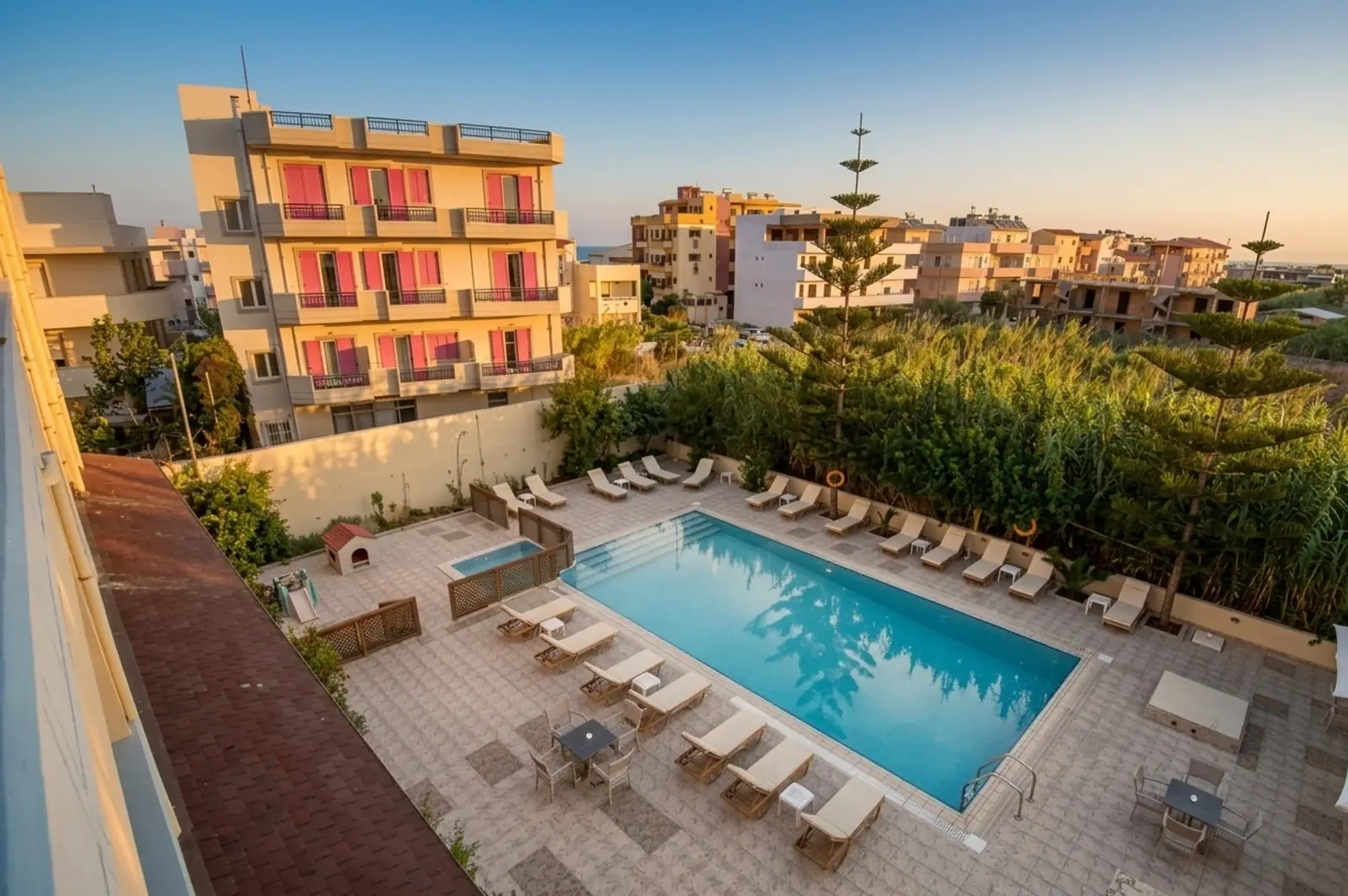 Eleni Palace hotel pool and building in Amoudara, Crete